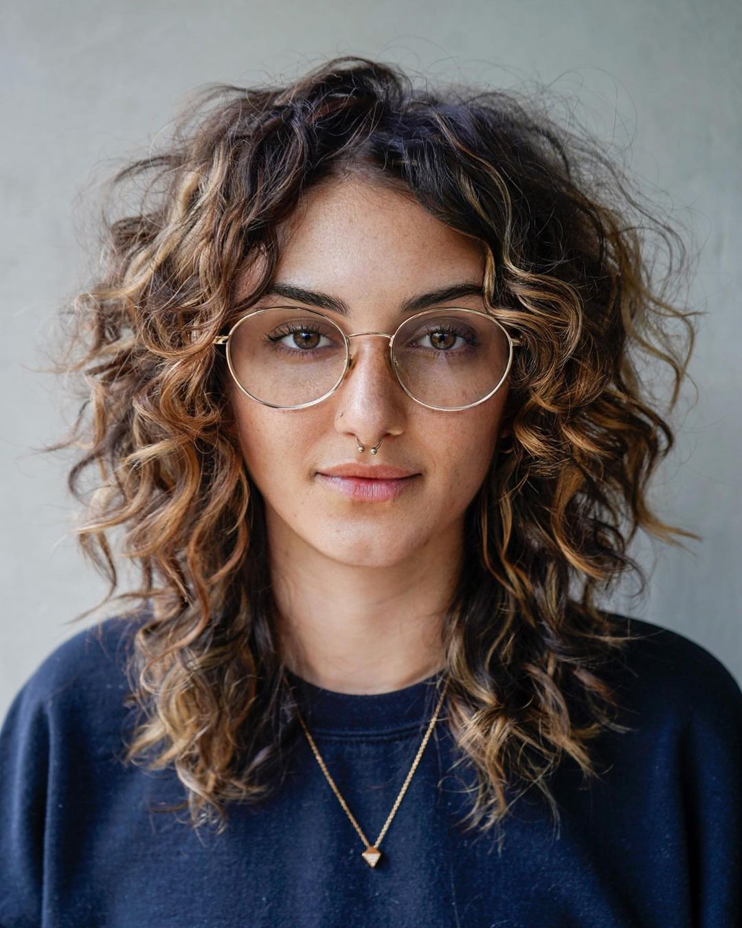 Mid-Back Curly Shag With Curly Bangs Mid-Back Curly Shag With Curly Bangs — Simple Shag Haircut