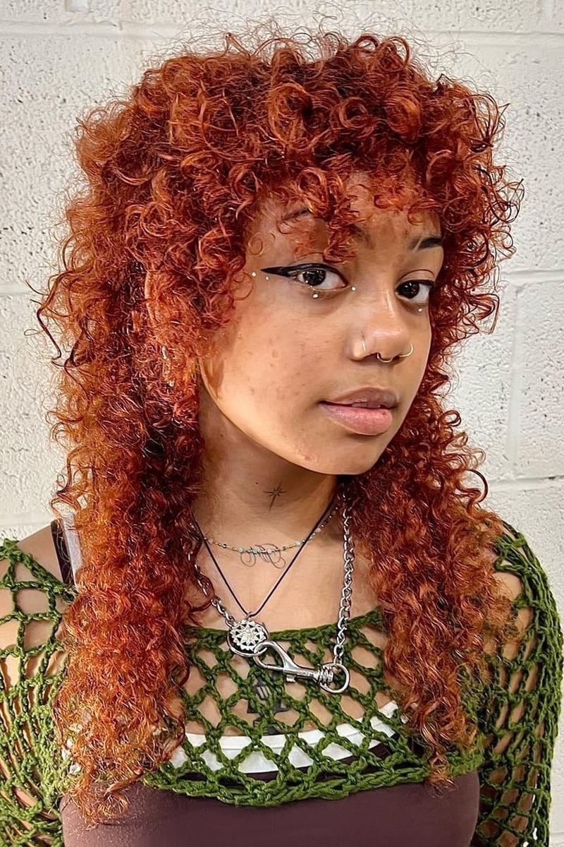 Mid-Back Curly Shag With Voluminous Curly Bangs Mid-Back Curly Shag With Voluminous Curly Bangs — Simple Shag Hairstyles