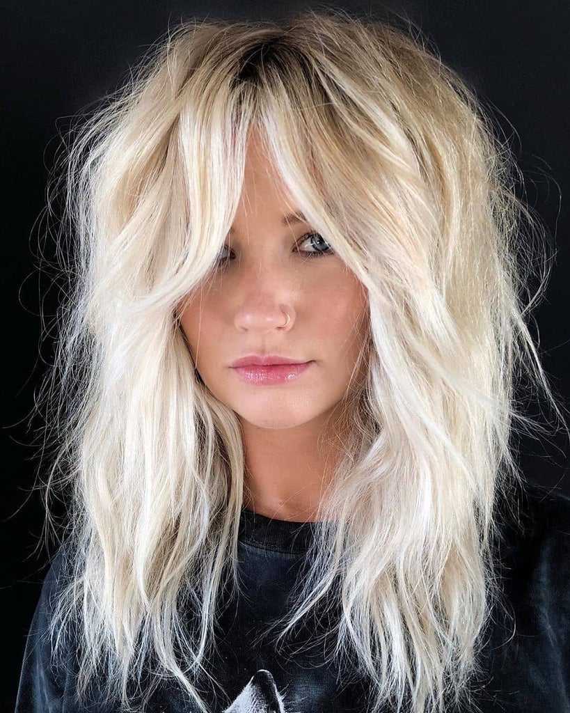 Mid-Back Platinum Blonde Shag With Voluminous Blowout Mid-Back Platinum Blonde Shag With Voluminous Blowout — Simple Shag Hairstyles