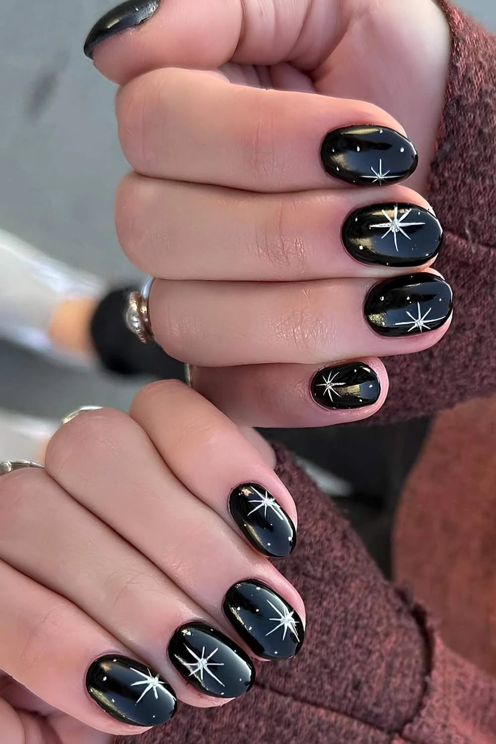 Glossy Black With White Starbursts Glossy Black With White Starbursts — Simple Short Black Nails