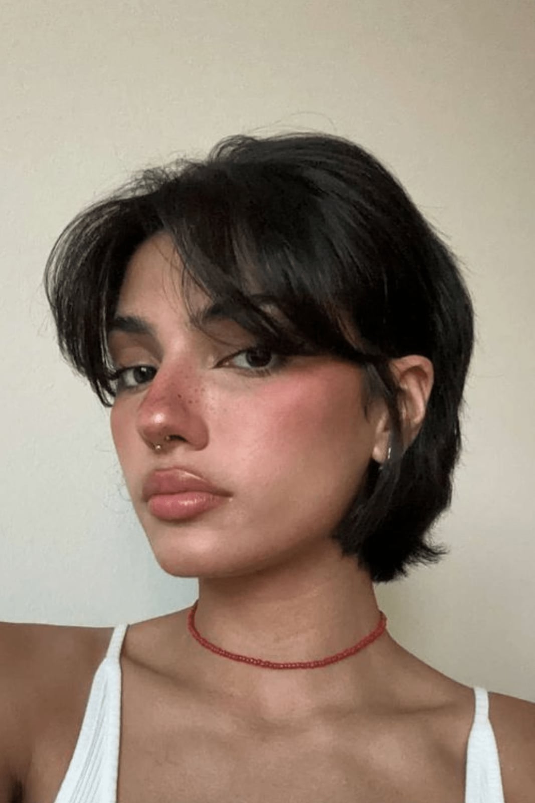 Chin Length Dark Brown Shag With Curtain Bangs and Parted To The Side — Simple Short Shag Haircuts
