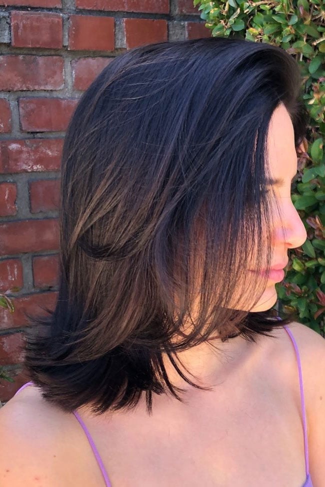 Layered Shoulder Cut Air Dried With The Camera Captures A Side View — Simple Shoulder Length Haircuts