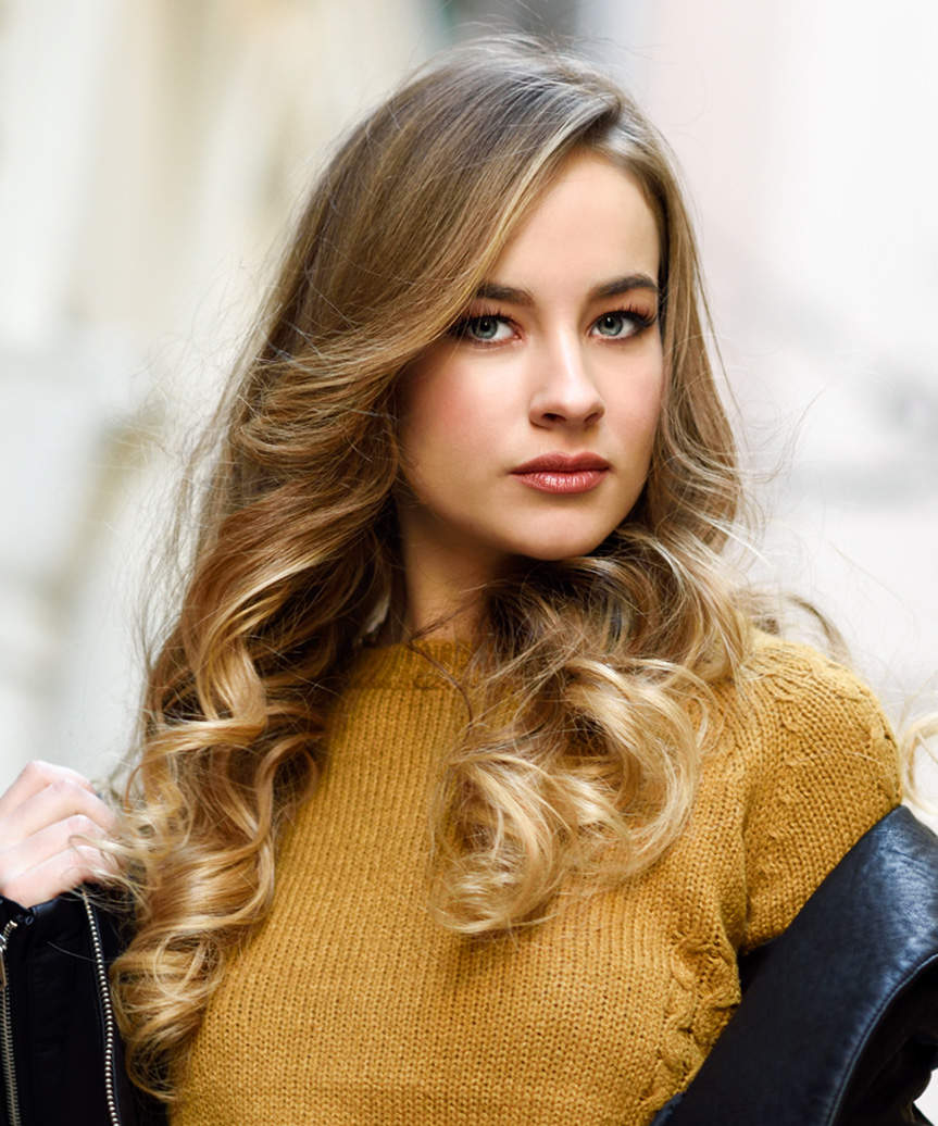 Mid-Back Honey Blonde Curls With Side Bangs — Simple Side Swept Bangs