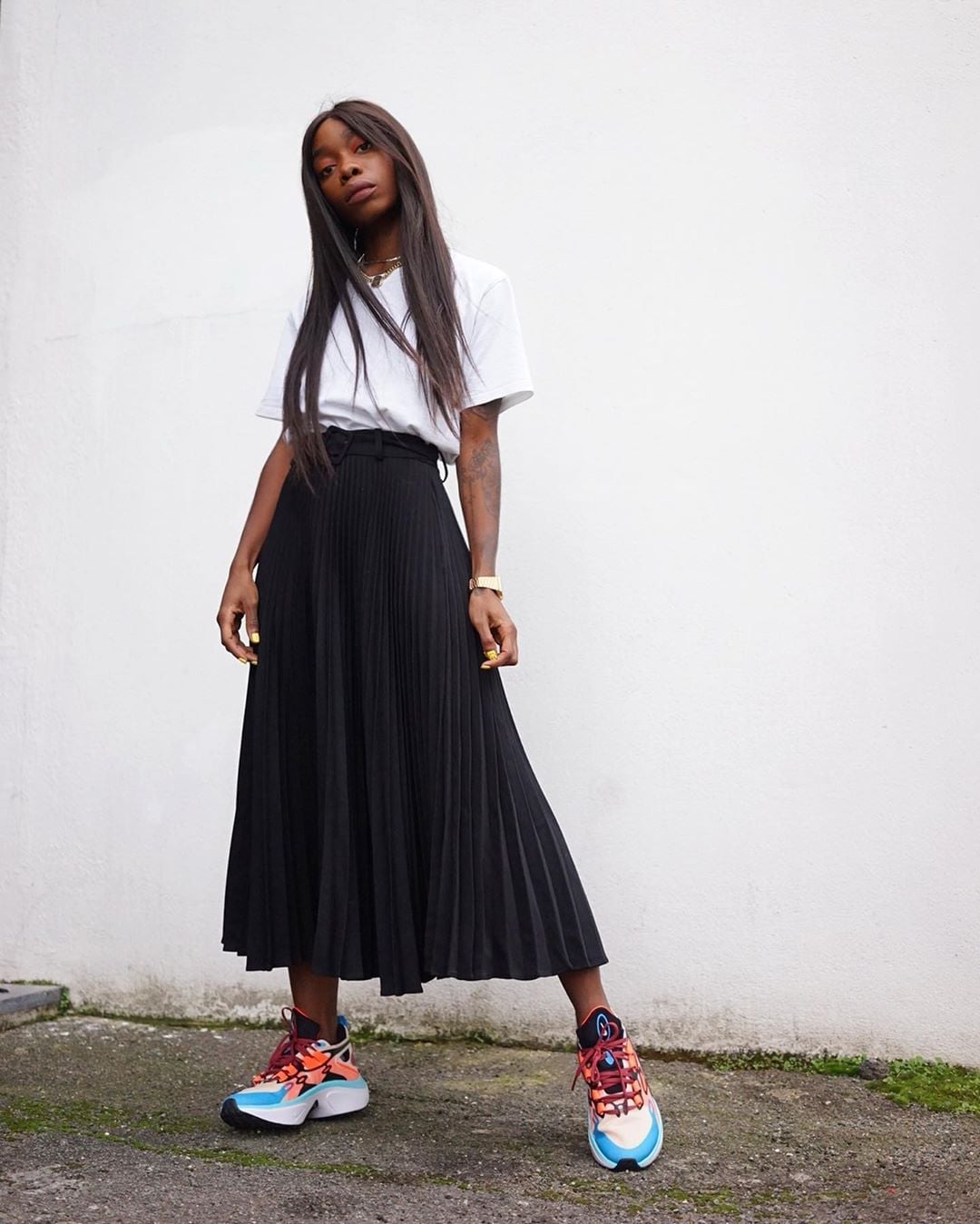 White T-Shirt with Black Pleated Midi Skirt White T-Shirt with Black Pleated Midi Skirt — Simple Style Inspo