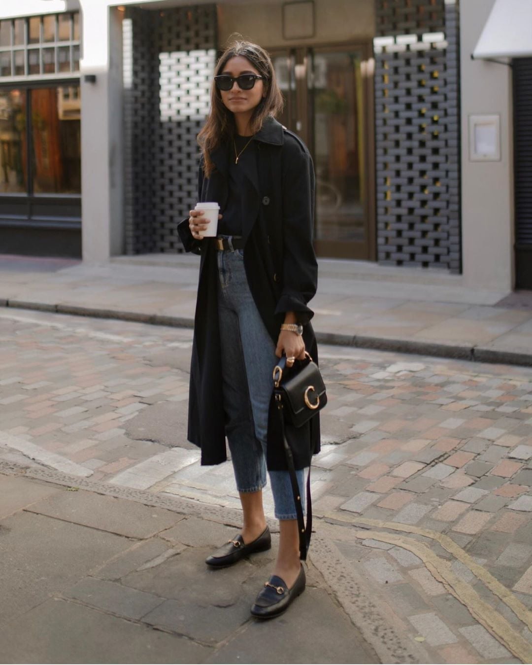 Black Trench Coat Over Black T-Shirt and Straight-Leg Jeans Black Trench Coat Over Black T-Shirt and Straight-Leg Jeans — Simple Style Inspo