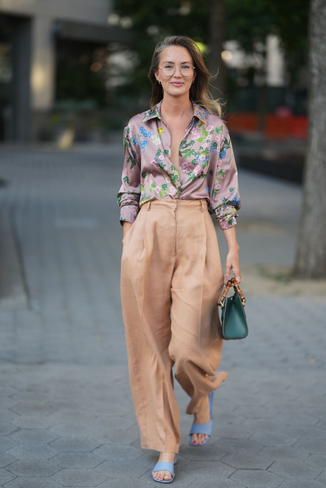 Tan Linen Trousers with a Vibrant Floral Silk Shirt Tan Linen Trousers with a Vibrant Floral Silk Shirt — Simple Tan Pants Outfits