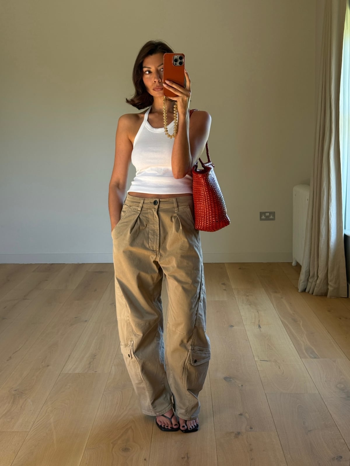 Tan Relaxed-Fit Wide-Leg Cargo Trousers with a Halter Top Tan Relaxed-Fit Wide-Leg Cargo Trousers with a Halter Top — Simple Tan Pants Outfits