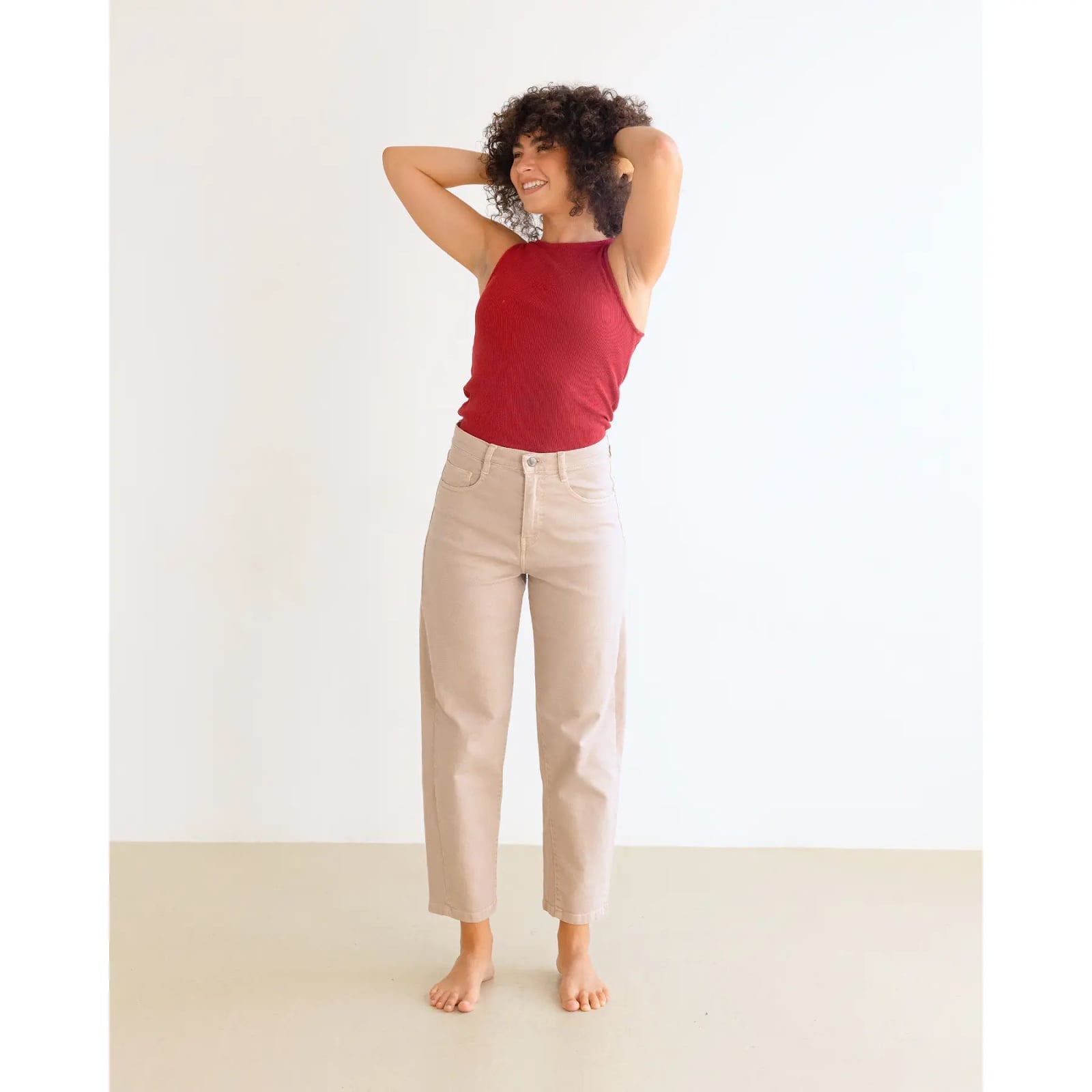 Tan Straight-Leg Trousers with a Red Ribbed Tank Top Tan Straight-Leg Trousers with a Red Ribbed Tank Top — Simple Tan Pants Outfits