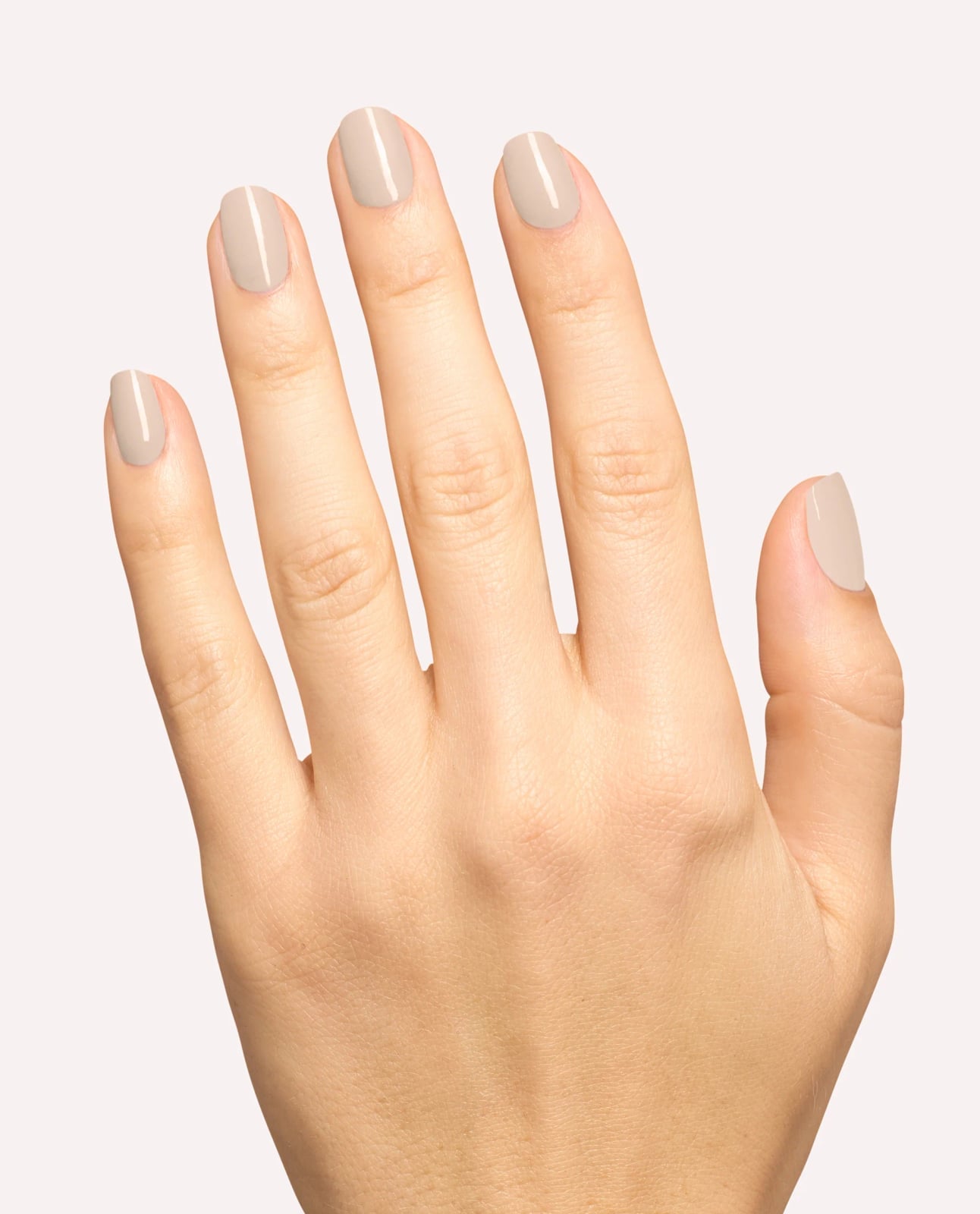 Glossy Light Neutral Taupe Short Oval Nails, Close-Up Take Glossy Light Neutral Taupe Short Oval Nails, Close-Up Take — Simple Taupe Nails