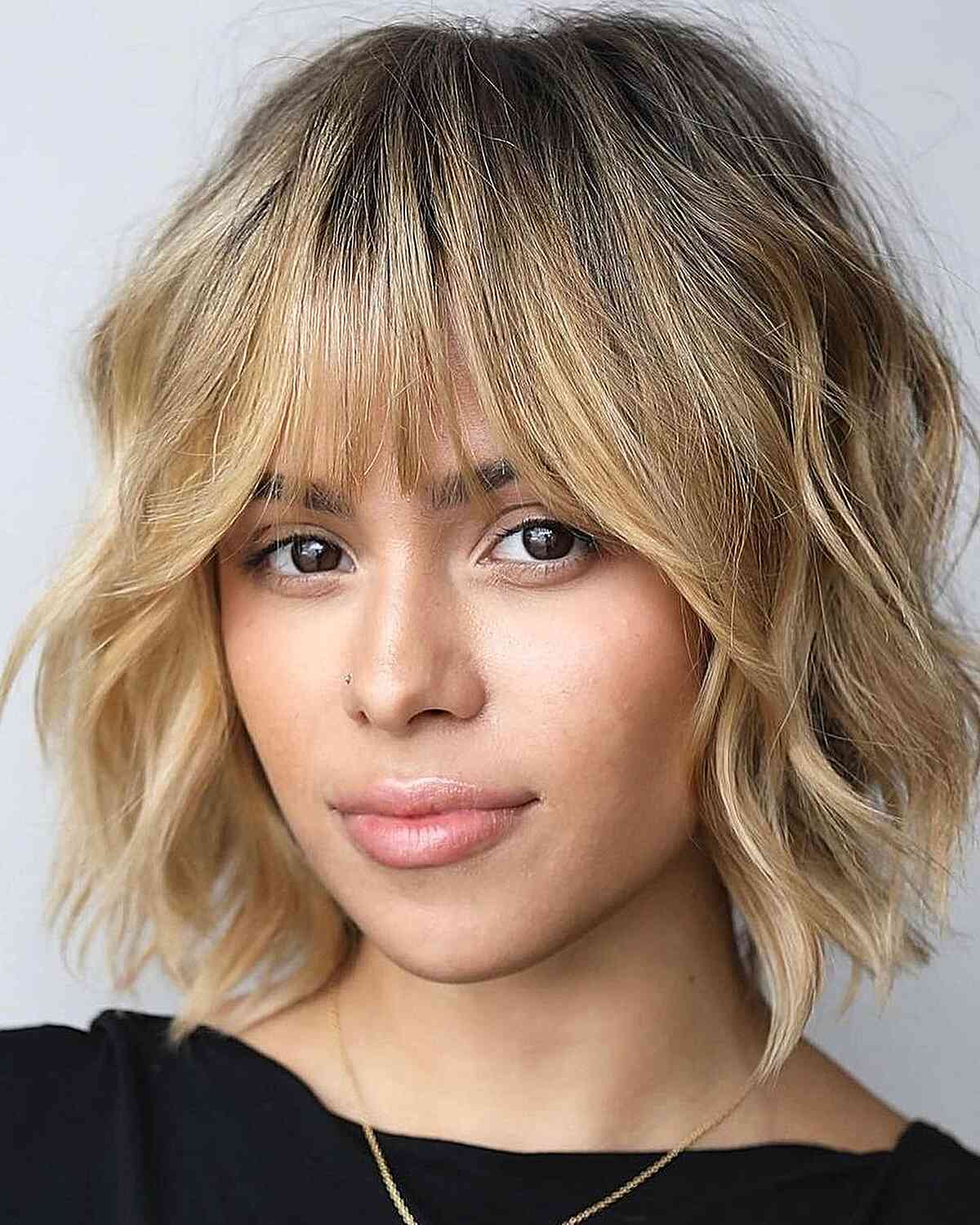 Collarbone Bob With Textured Curtain Bangs Collarbone Bob With Textured Curtain Bangs — Simple Textured Bob
