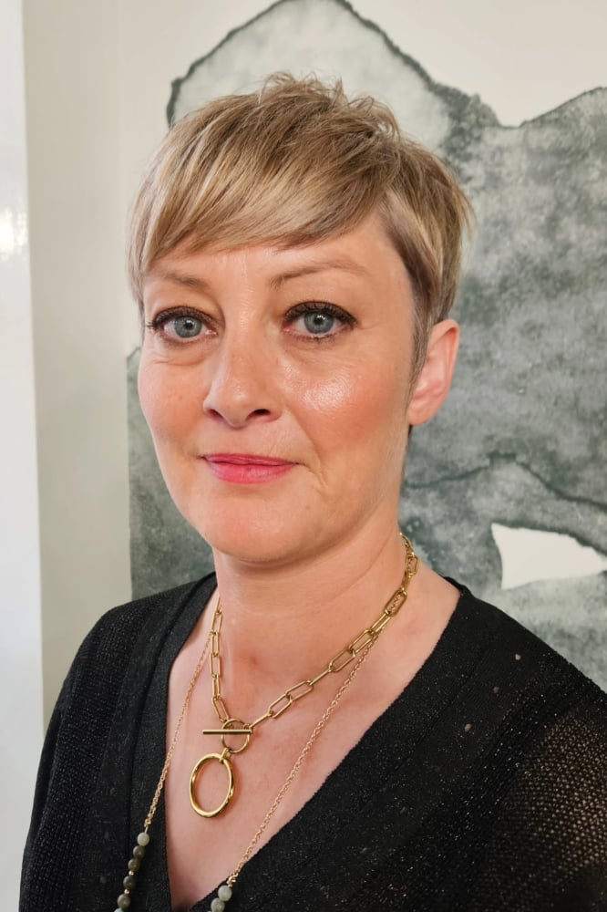 Voluminous Blonde Pixie With Tousled Styling — Simple Thinning Hairstyles