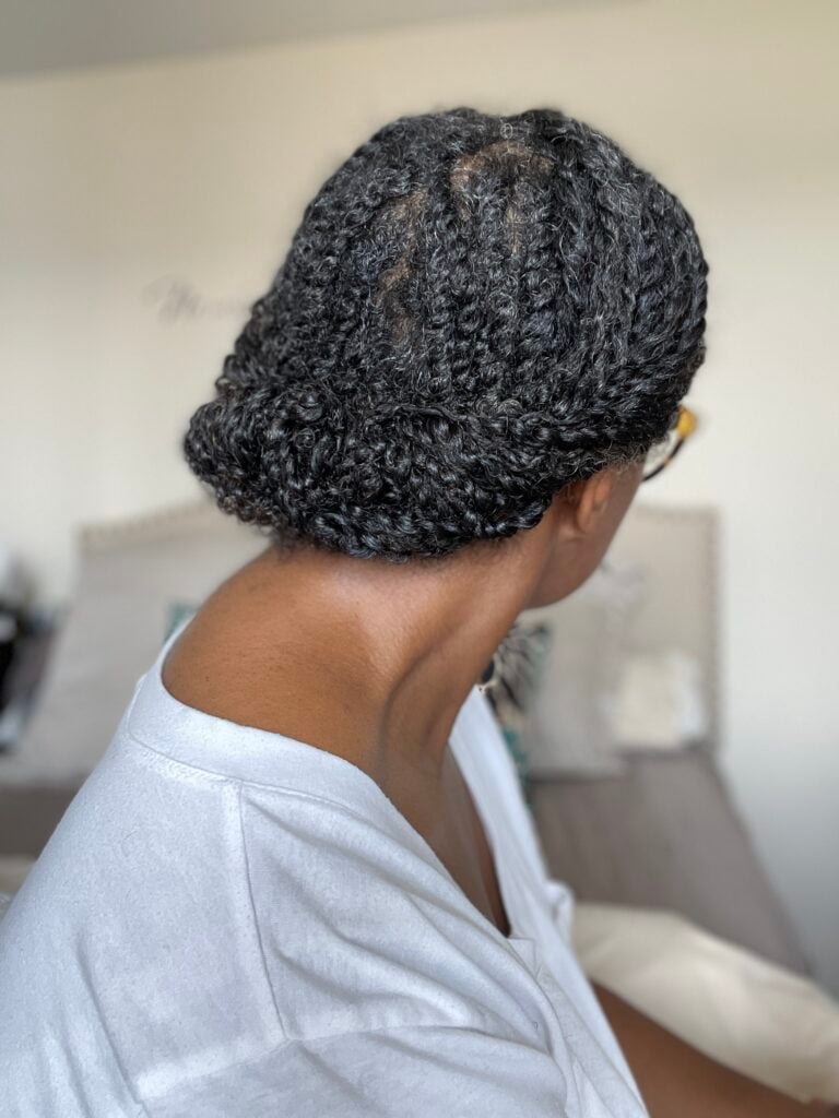 Black Twists Styled In A Bun Black Twists Styled In A Bun — Simple Two Strand Twists