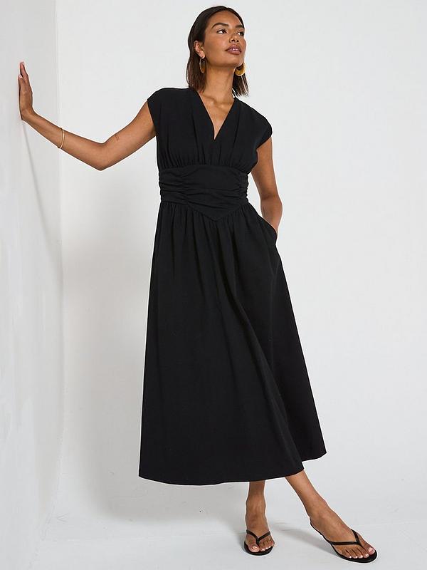 Black Textured V-neck Midaxi Dress with Shirred Waist Black Textured V-neck Midaxi Dress with Shirred Waist — Simple V Neck Dress