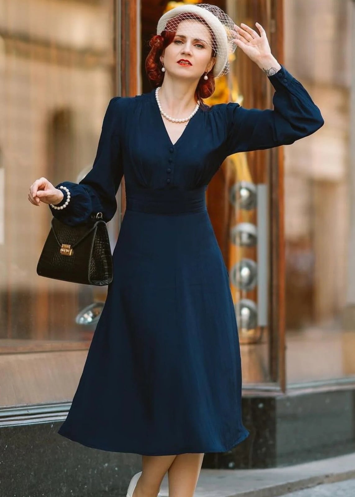 Navy Blue Long Sleeve Dress with Button Details and Flowing Skirt Navy Blue Long Sleeve Dress with Button Details and Flowing Skirt — Simple V Neck Dress