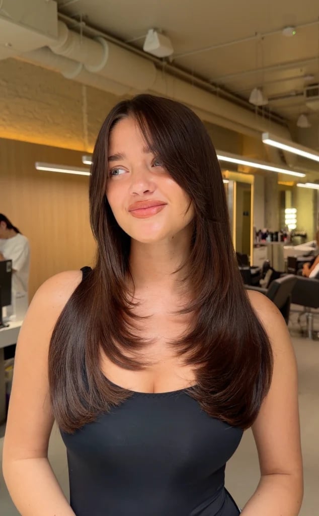 Mid-Back Layers With Curtain Bangs Mid-Back Layers With Curtain Bangs — Simple Voluminous Hair