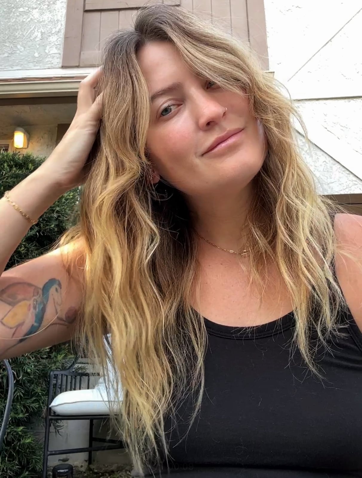 Mid-Back Blonde Balayage Beach Waves With Side Swept Bangs Mid-Back Blonde Balayage Beach Waves With Side Swept Bangs — Simple Waves Hair