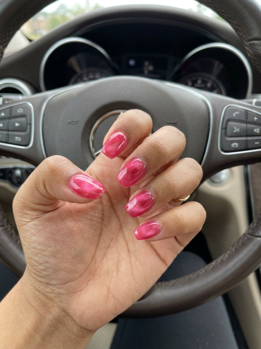 Playful watermelon jelly cat-eye round nails for vacation or summer party, vibrant summer nail art 2026.