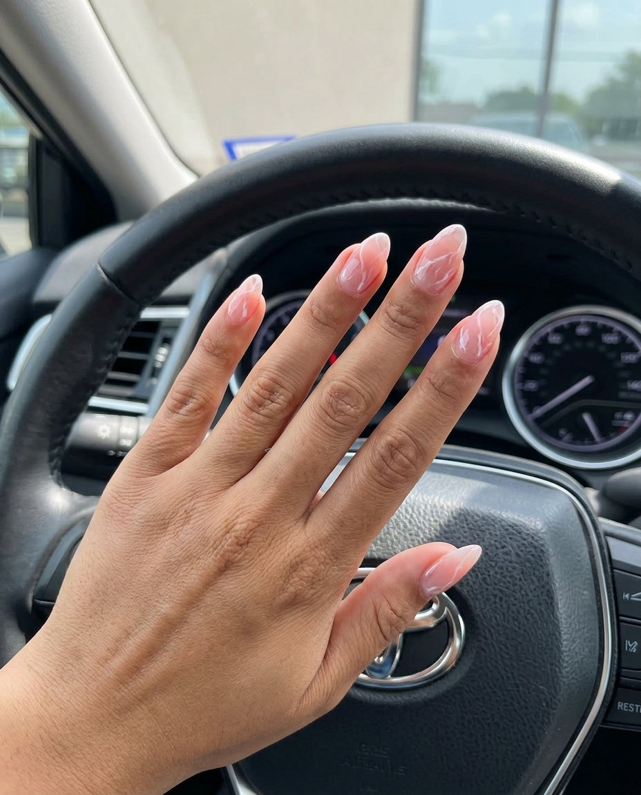 Summer Peach Nails 2026: Marble Almond Bliss Bohemian Sheer Peach Marble Almond nails for summer 2026. Vacation style.
