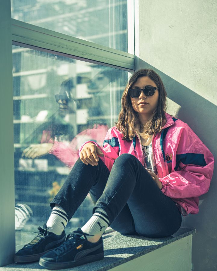 Color Block Windbreaker With Graphic T-shirt and Black Jeans — Trendy 80s Outfits