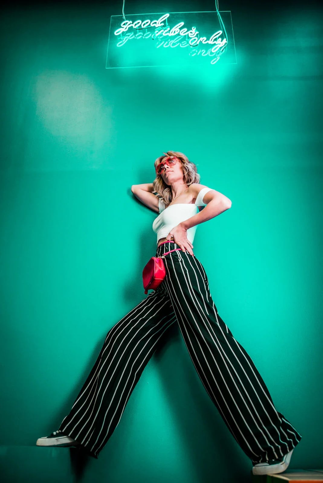 Striped Wide-Leg Pants and Off-the-Shoulder Top — Trendy 80s Party Outfit