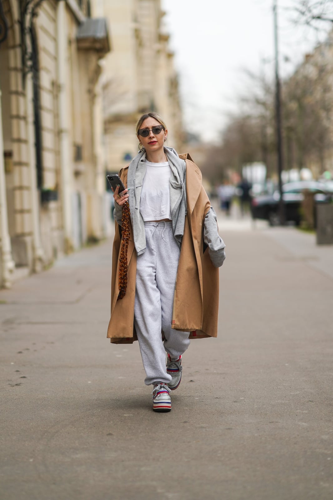 Camel Trench Coat Over Grey Sweatpants — Trendy Athleisure Outfits