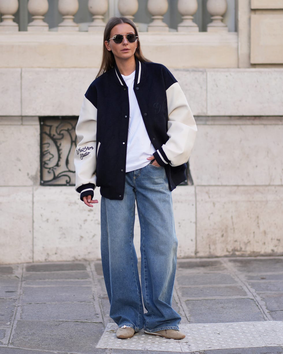 Varsity Jacket Over Denim Jeans — Trendy Athleisure Outfits
