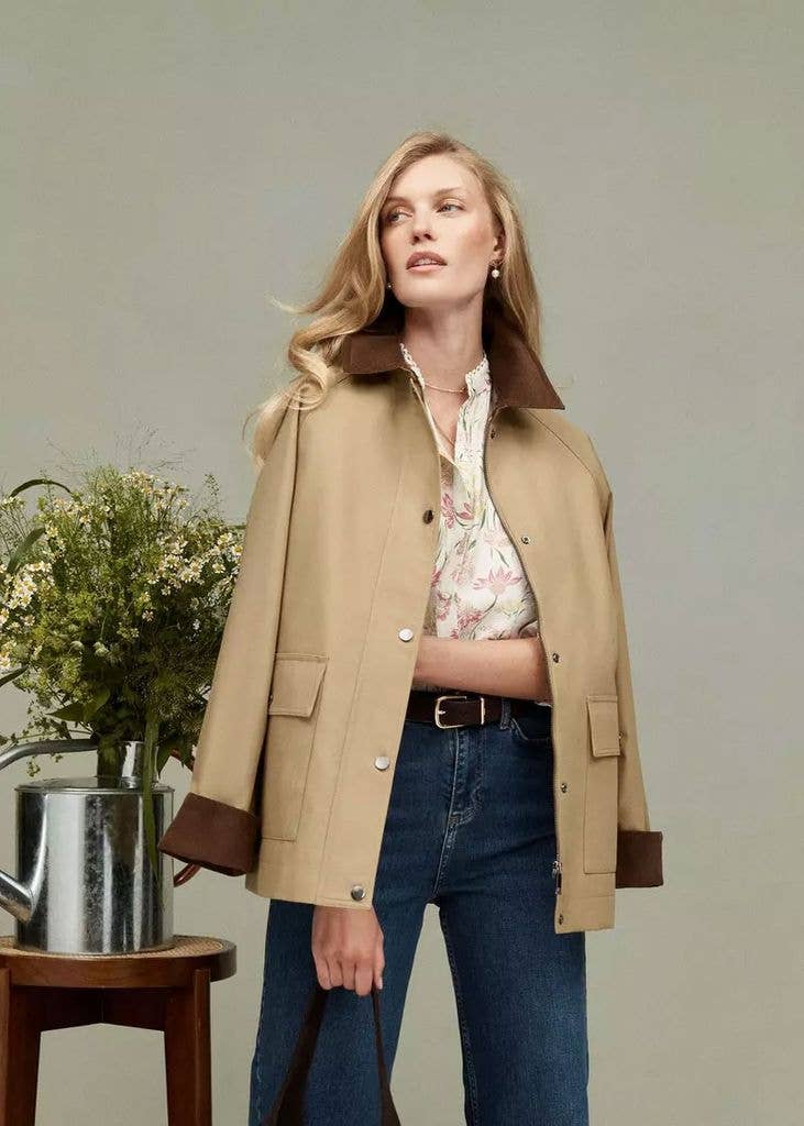 Tan Barn Jacket With Floral Blouse And Blue Jeans — Trendy Barn Jacket Outfit
