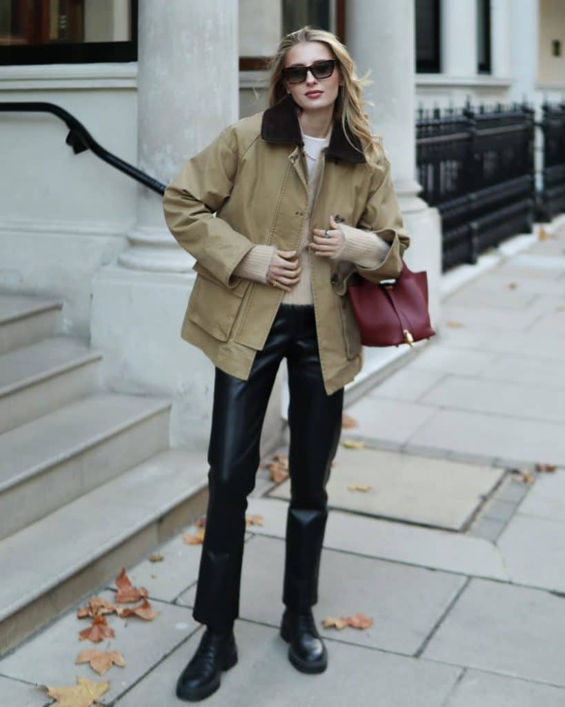 Tan Barn Jacket With Knit Sweater And Leather Trousers — Trendy Barn Jacket Outfit
