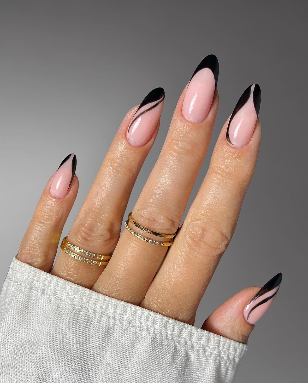 Wavy Black Line Glossy Almond Nails — Trendy Black Almond Nails