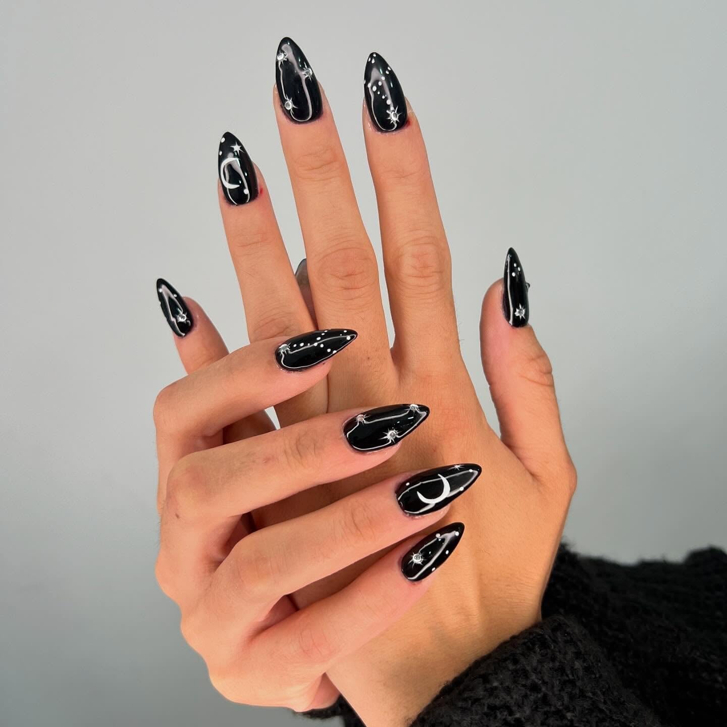 Celestial Art Glossy Black Long Almond Nails — Trendy Black Almond Nails