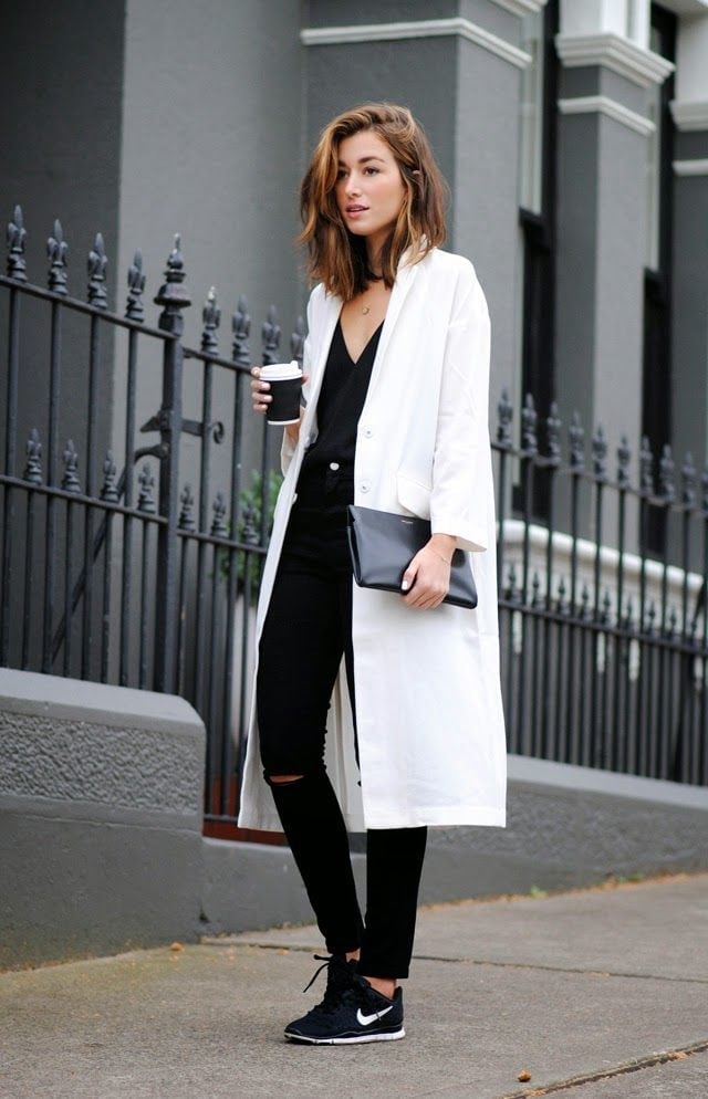 White Longline Coat Over Black Ripped Jeans — Trendy Black and White Outfits
