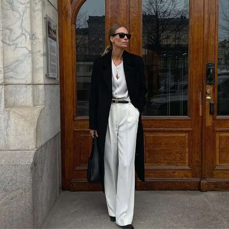 Chic Black Coat Over White Blouse and Wide-Leg Trousers — Trendy Black and White Outfits