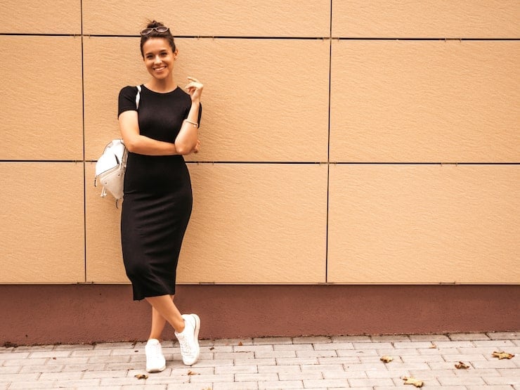 Fitted Black Midi Dress with White Backpack — Trendy Black and White Outfits