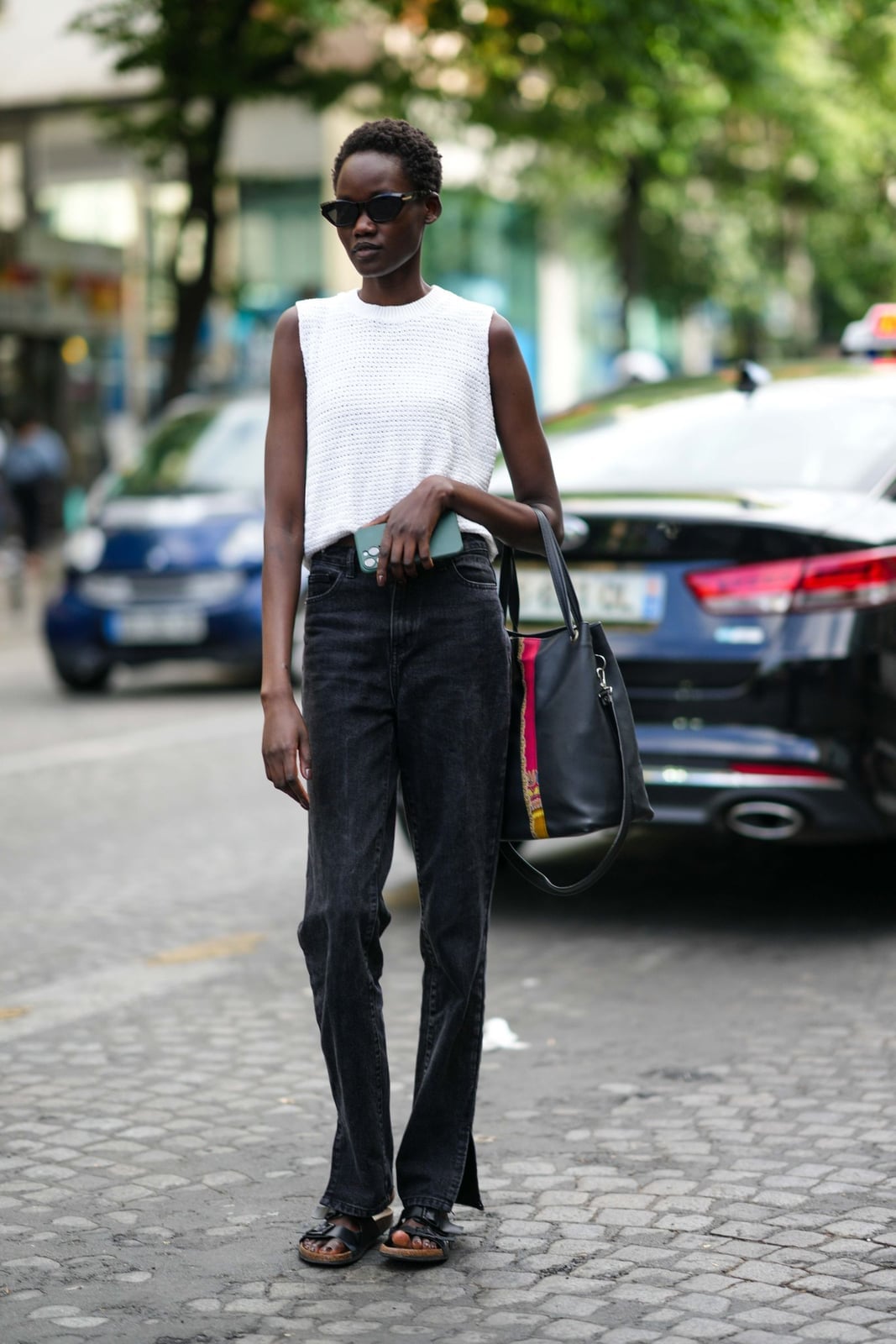 Casual Black Jeans With White Knit Top — Trendy Black Baggy Jeans Outfit