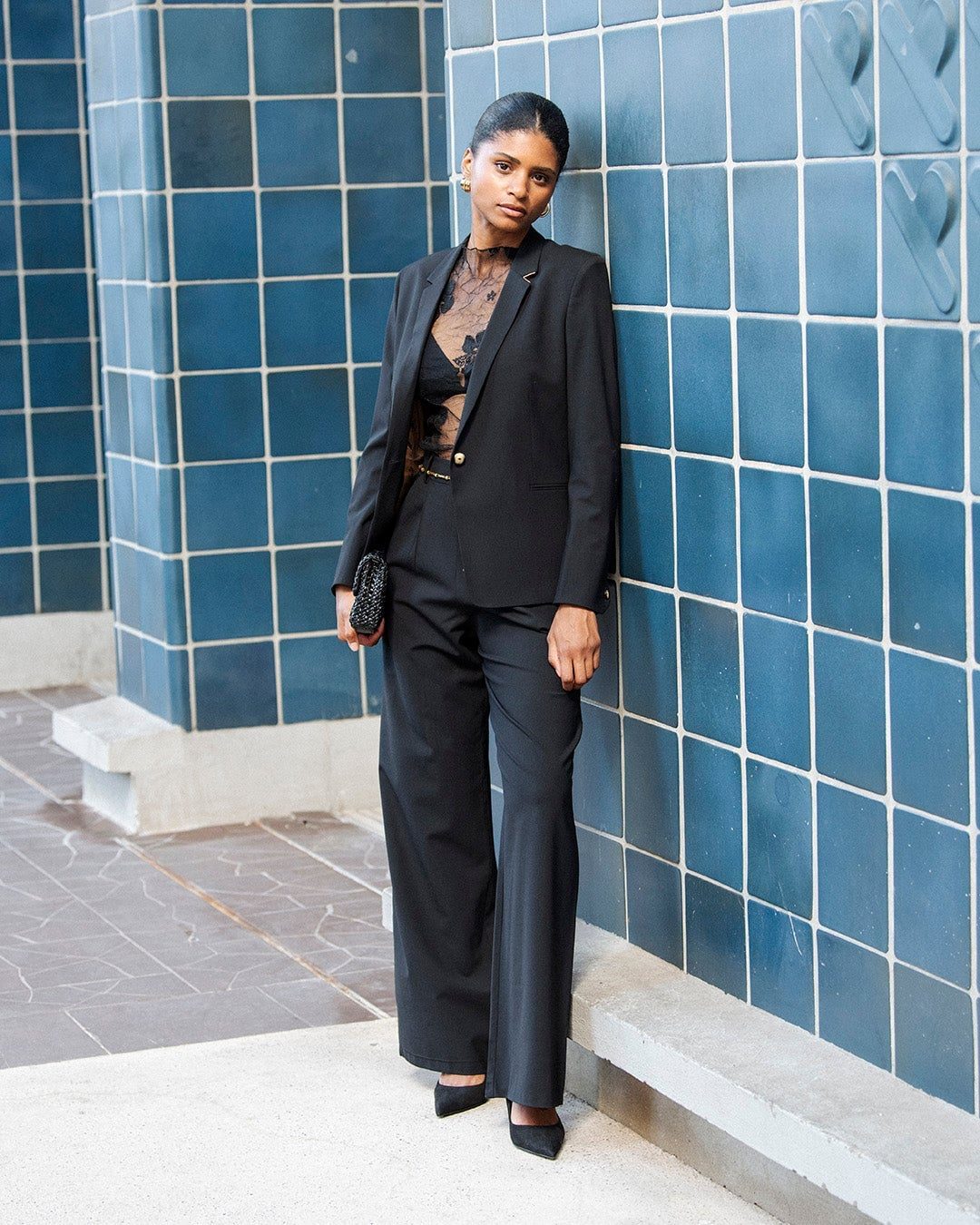 Fitted Black Blazer with Lace Bralette and Wide-Leg Trousers — Trendy Black Blazer Outfit
