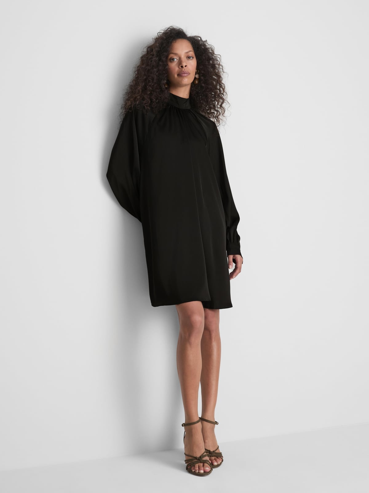 Mock Neck Black A-Line Shift Dress With Strappy Heeled Sandals Mock Neck Black A-Line Shift Dress With Strappy Heeled Sandals — Trendy Black Dress Outfits