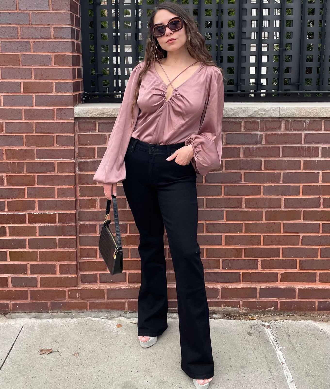 Pink Satin Blouse with Black Flare Jeans for Evening Casual Pink Satin Blouse with Black Flare Jeans for Evening Casual — Trendy Black Flare Jeans Outfit