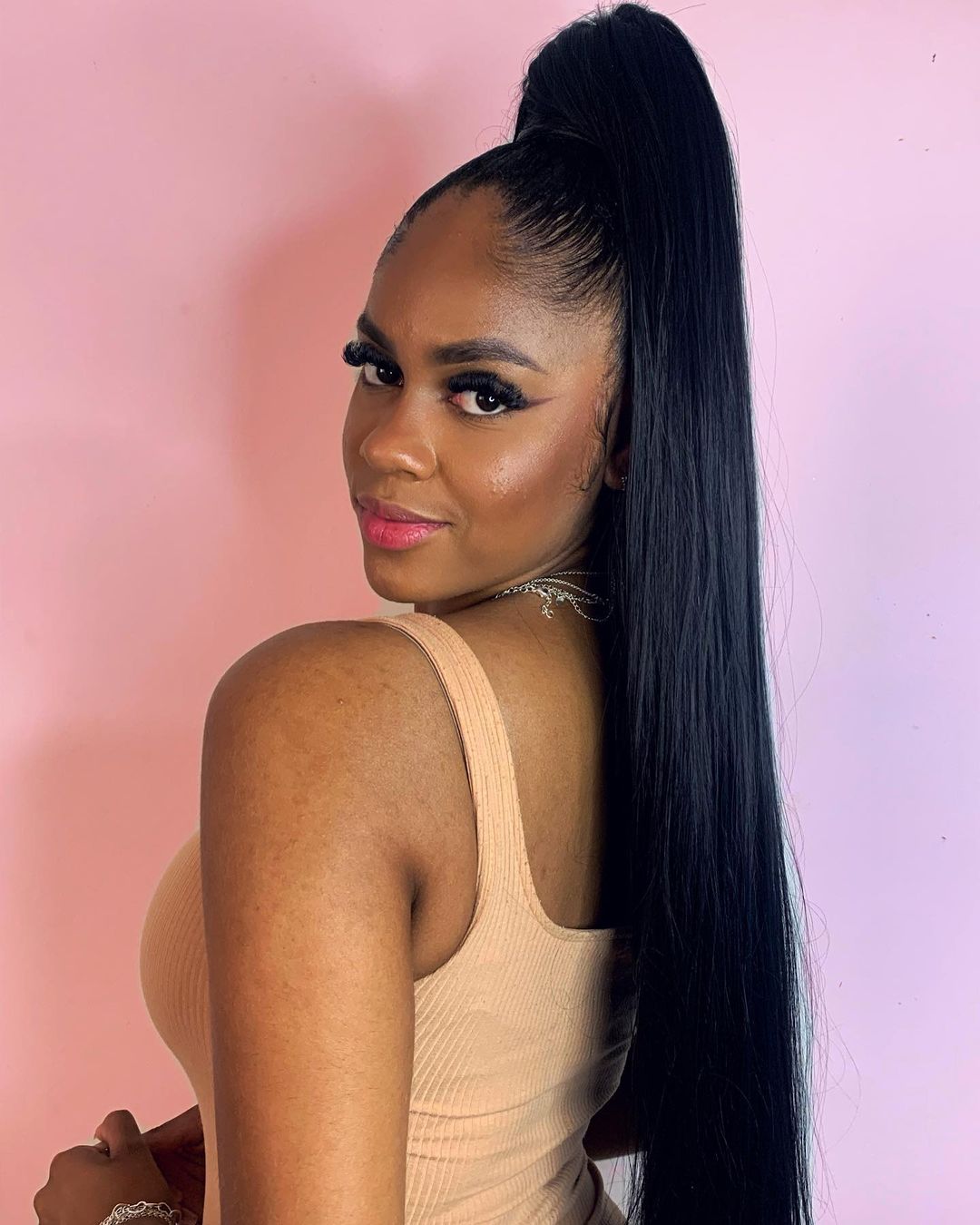 Mid-Back Ponytail With Sleek Finish — Trendy Black Hair