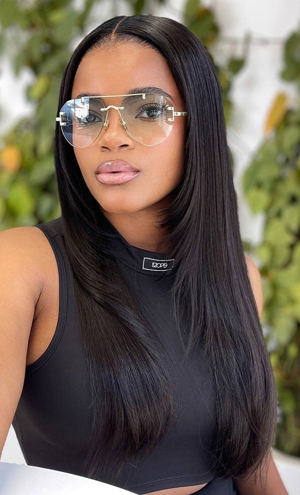 Mid-Back Sleek Straight With Subtle Layers — Trendy Black Hair