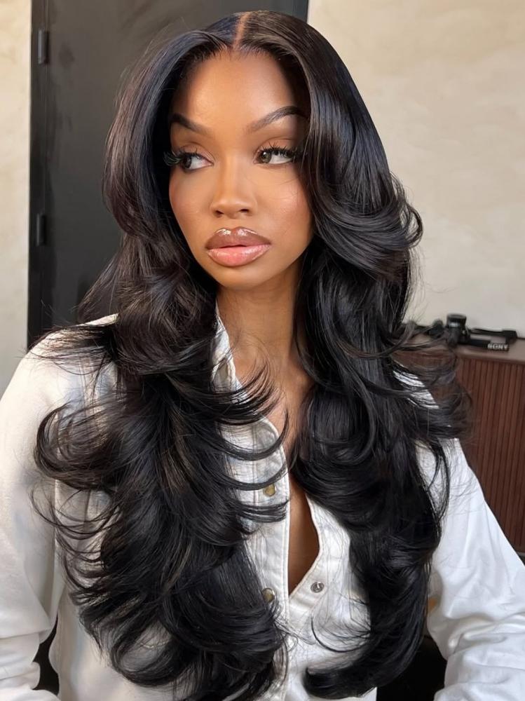 Mid-Back Waves With Voluminous Layers — Trendy Black Hair