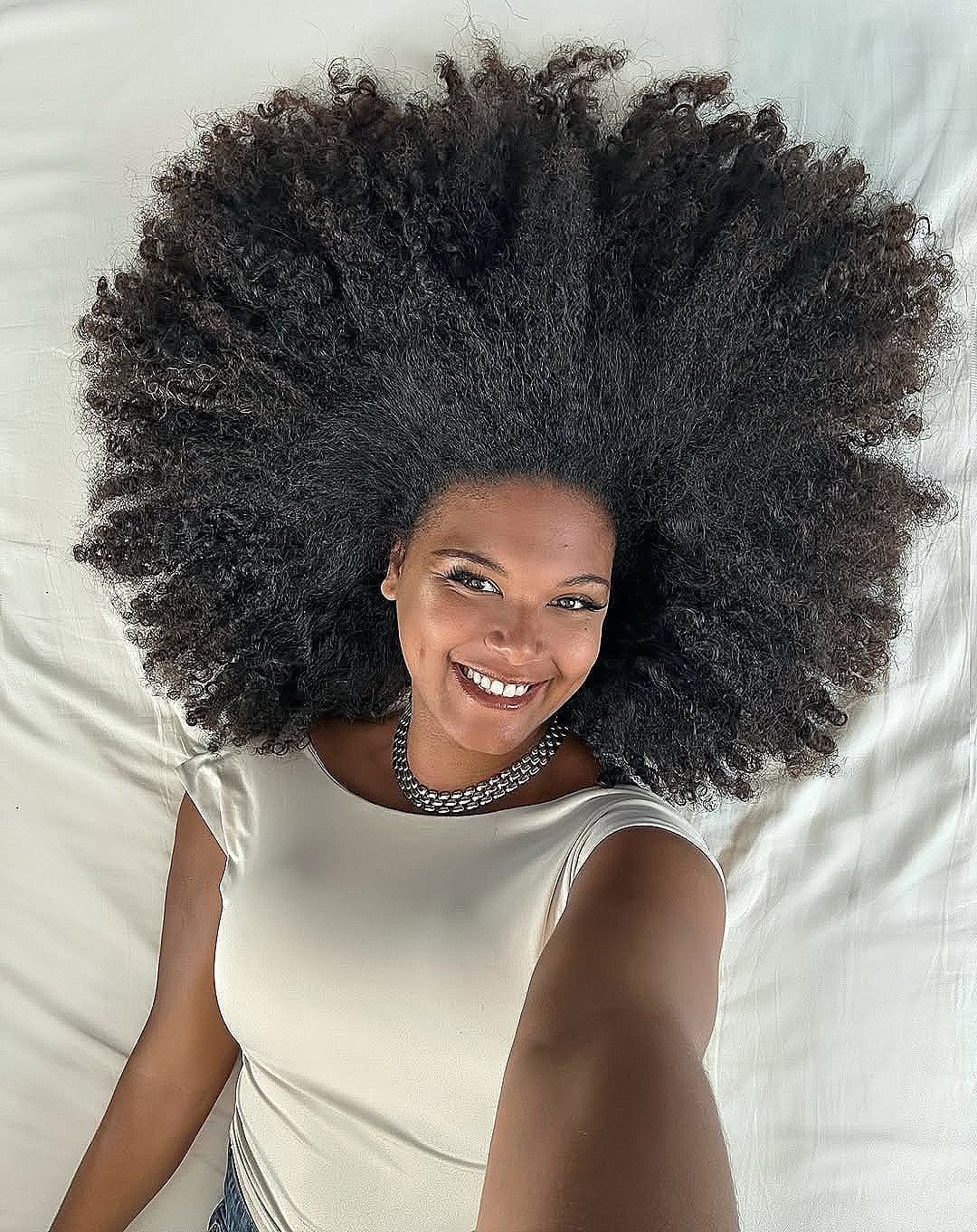 Mid-Back Voluminous Afro — Trendy Black Hair