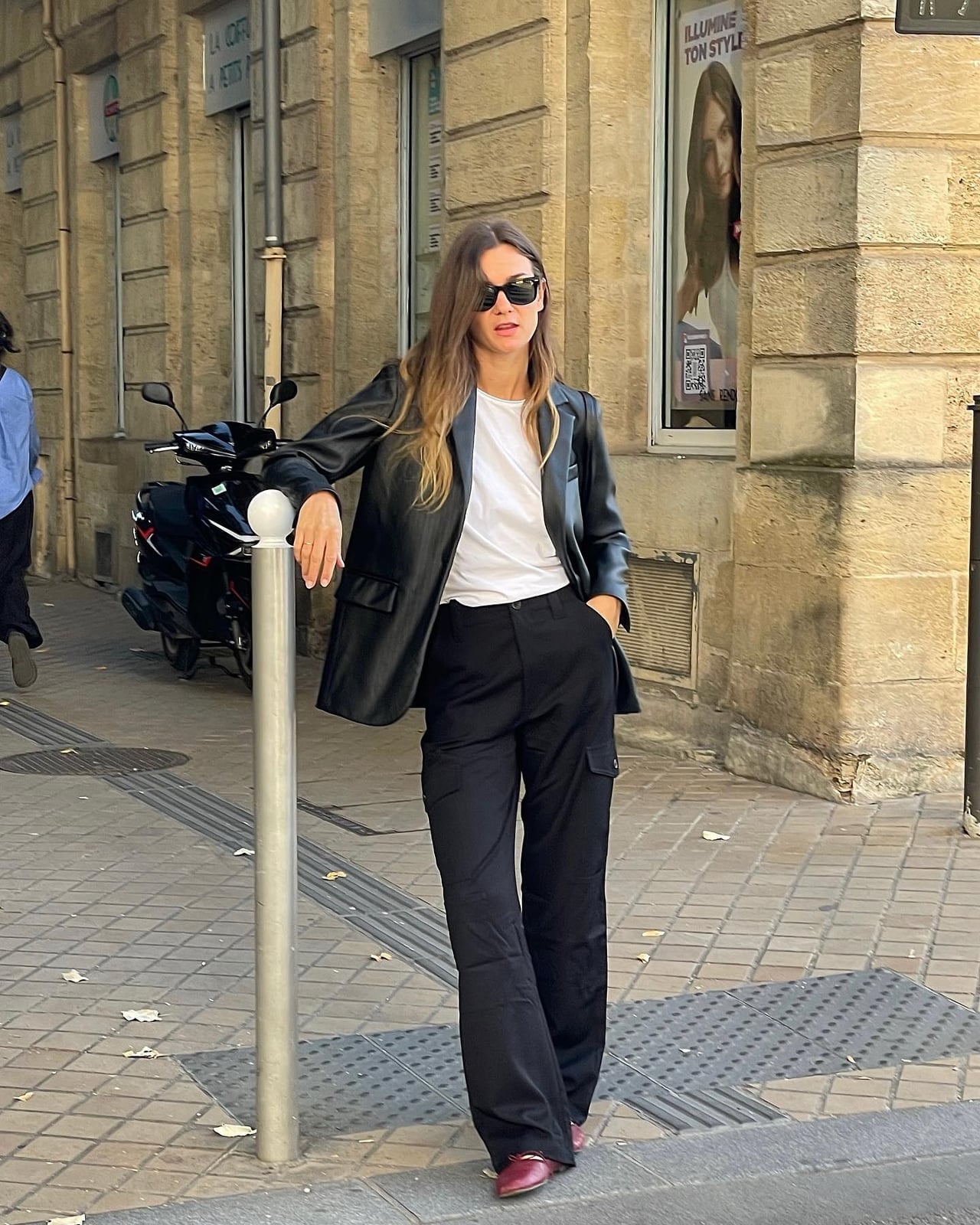 Black Faux Leather Blazer Over White T-Shirt and Cargo Pants — Trendy Black Outfits
