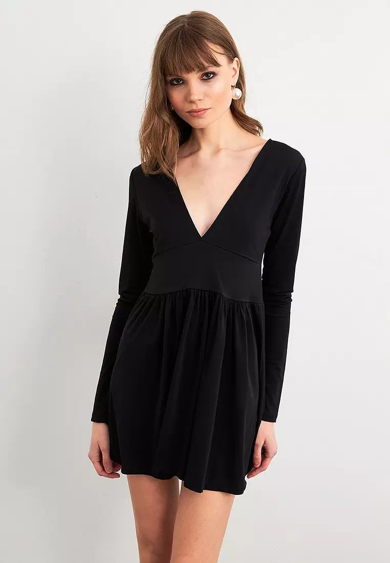 Black Jersey Dress with Deep V-neck and Flared Skirt — Trendy Black Outfits