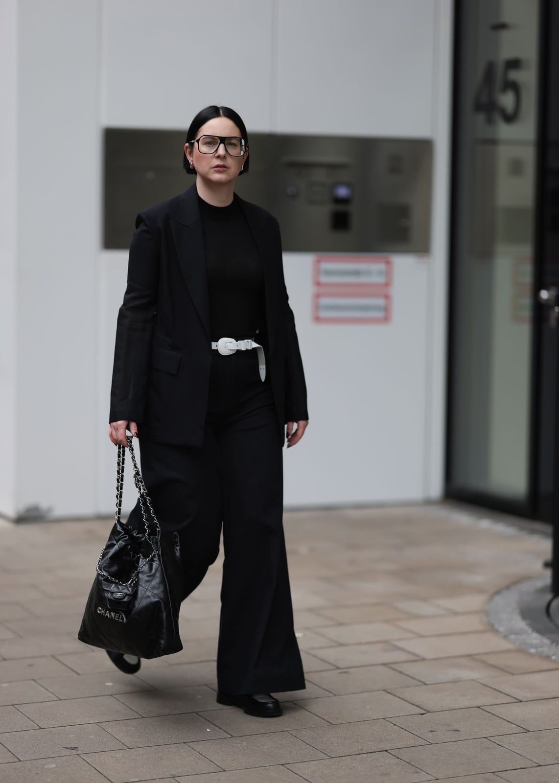 Black Wide Leg Trousers with White Statement Belt Black Wide Leg Trousers with White Statement Belt — Trendy Black Trousers Outfit