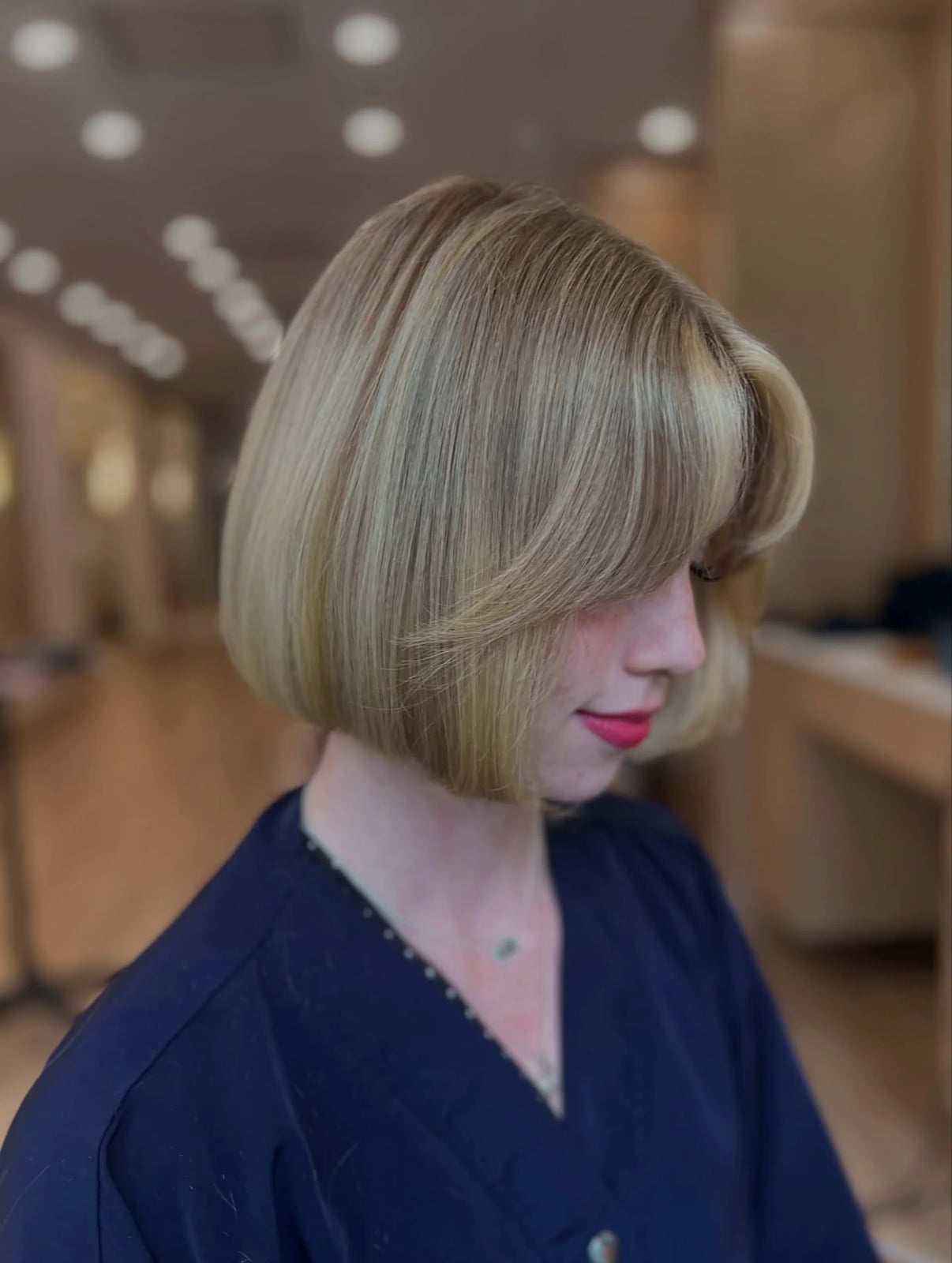 Honey Blonde Bob With Layered Curtain Bangs and Soft Waves — Trendy Blonde Bob