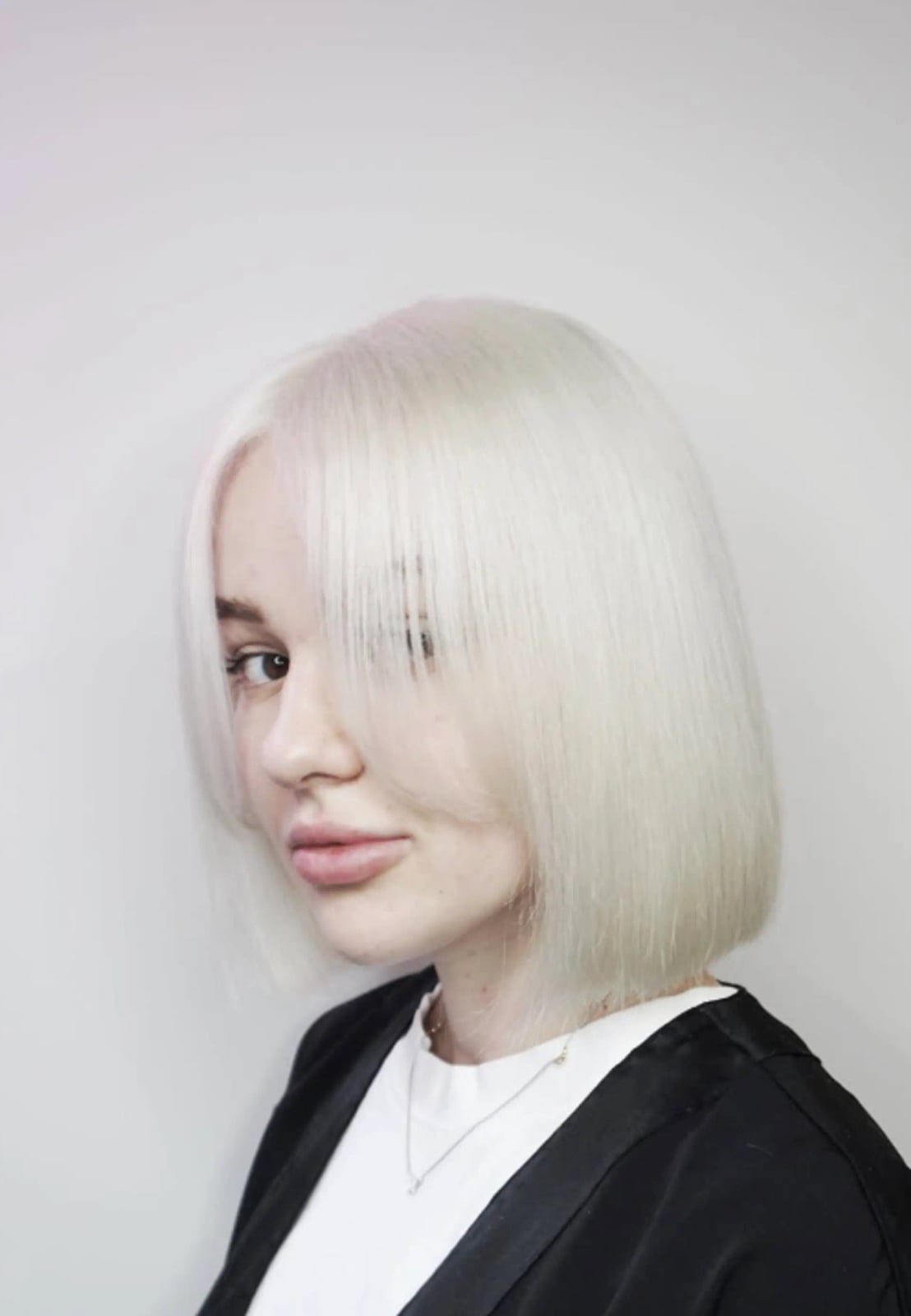 Icy Blonde Blunt Bob With Baby Bangs — Trendy Blonde Bob