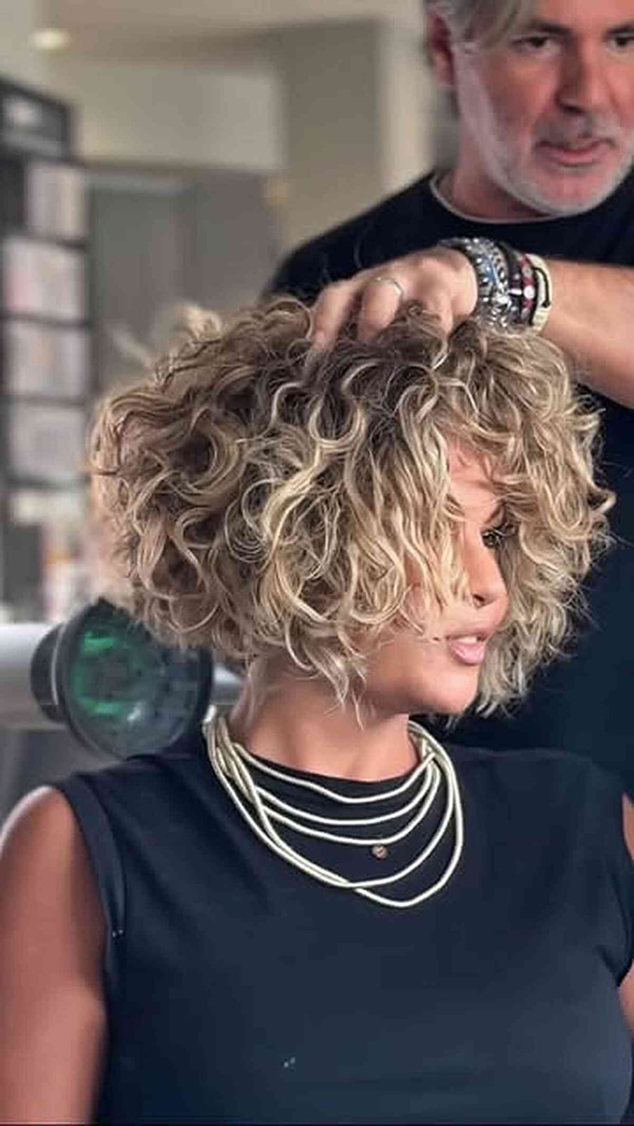 Chin Length Curly Bob With Curtain Bangs — Trendy Blonde Bob
