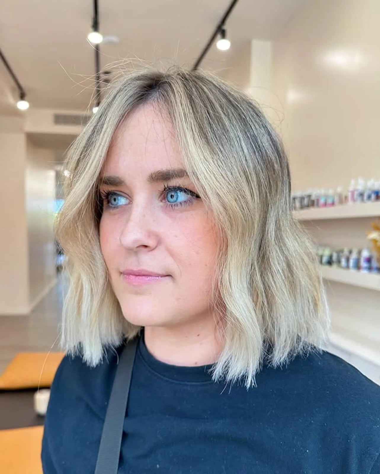 Icy Blonde Lob With Wispy Bangs — Trendy Blonde Lob