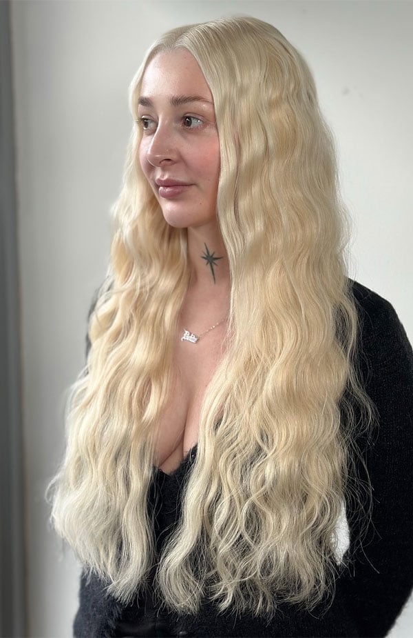 Mid-Back Platinum Blonde Flowing Waves With Long Layers Mid-Back Platinum Blonde Flowing Waves With Long Layers — Trendy Blonde Wavy Hair