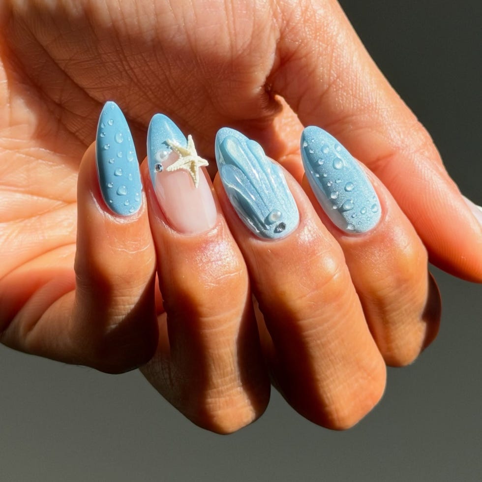 Medium Almond Blue 3D Water Droplet Nails Medium Almond Blue 3D Water Droplet Nails — Trendy Blue Acrylic Nails